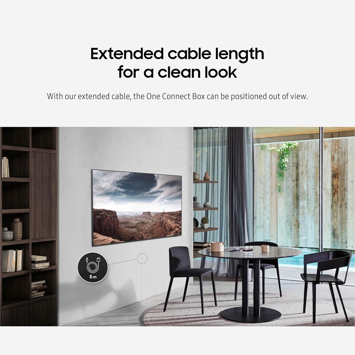 Lifestyle living room showing a wall-mounted TV with the One Connect Box positioned out of view, indicating extended cable length.