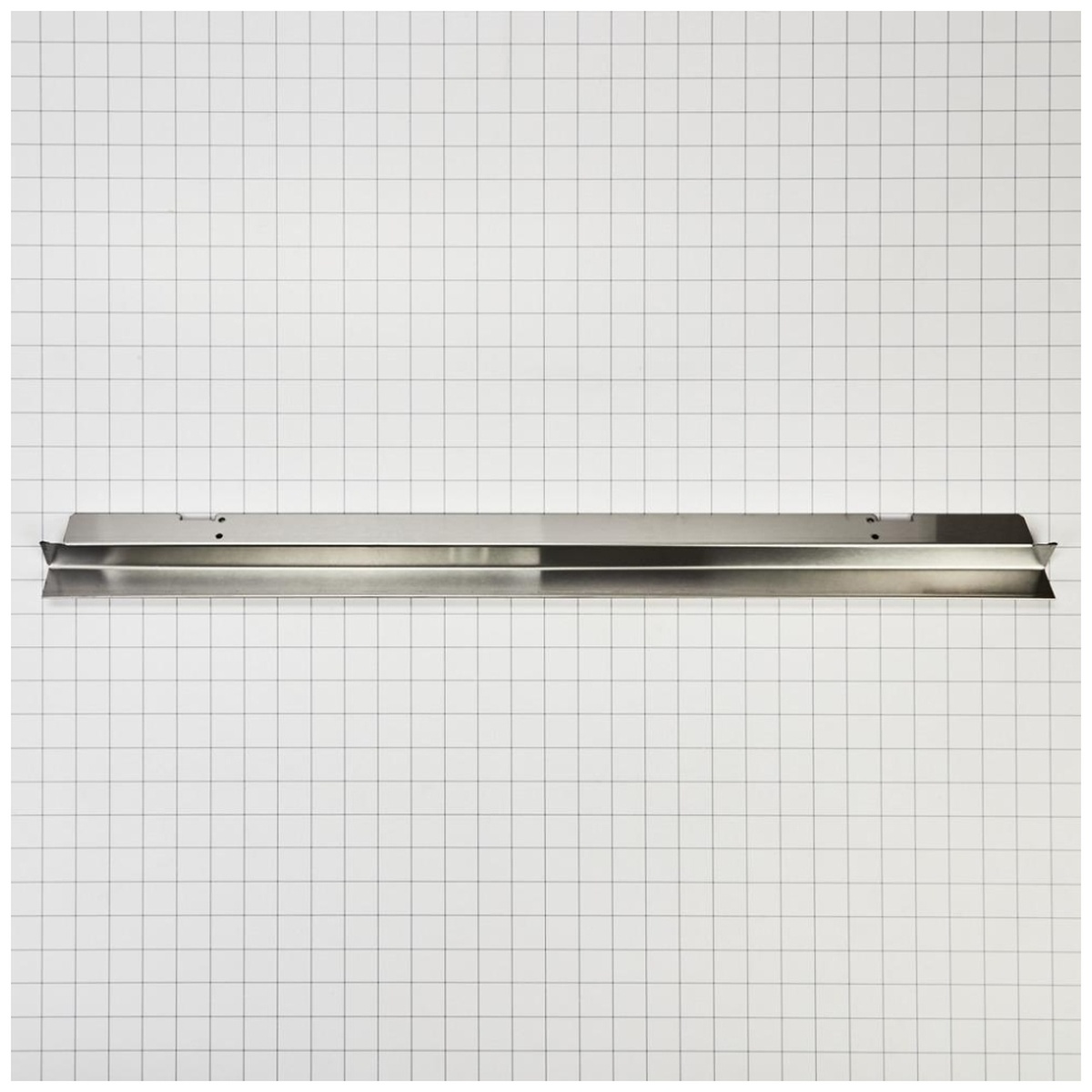 Full-length trim kit with pre-drilled holes against grid background