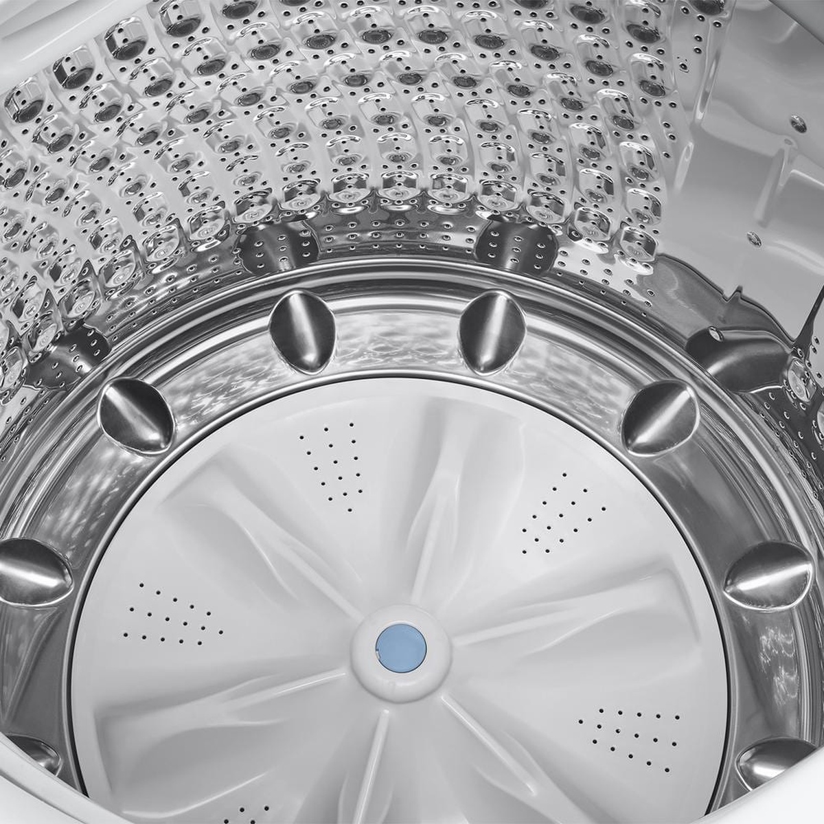 Close-up of Swirl+ stainless steel drum interior of the washer.