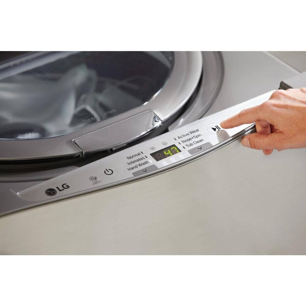 Close-up of LG SideKick control panel with play/pause touch button and LED timer.