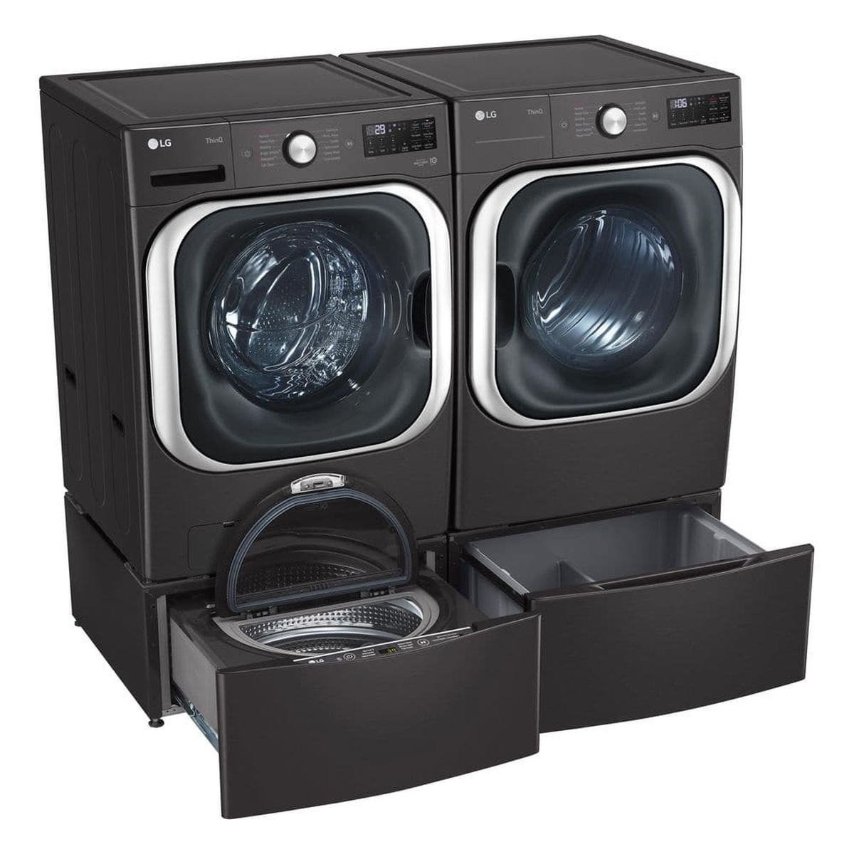 LG front-load washer and dryer installed on pedestals with drawers open in a laundry setup