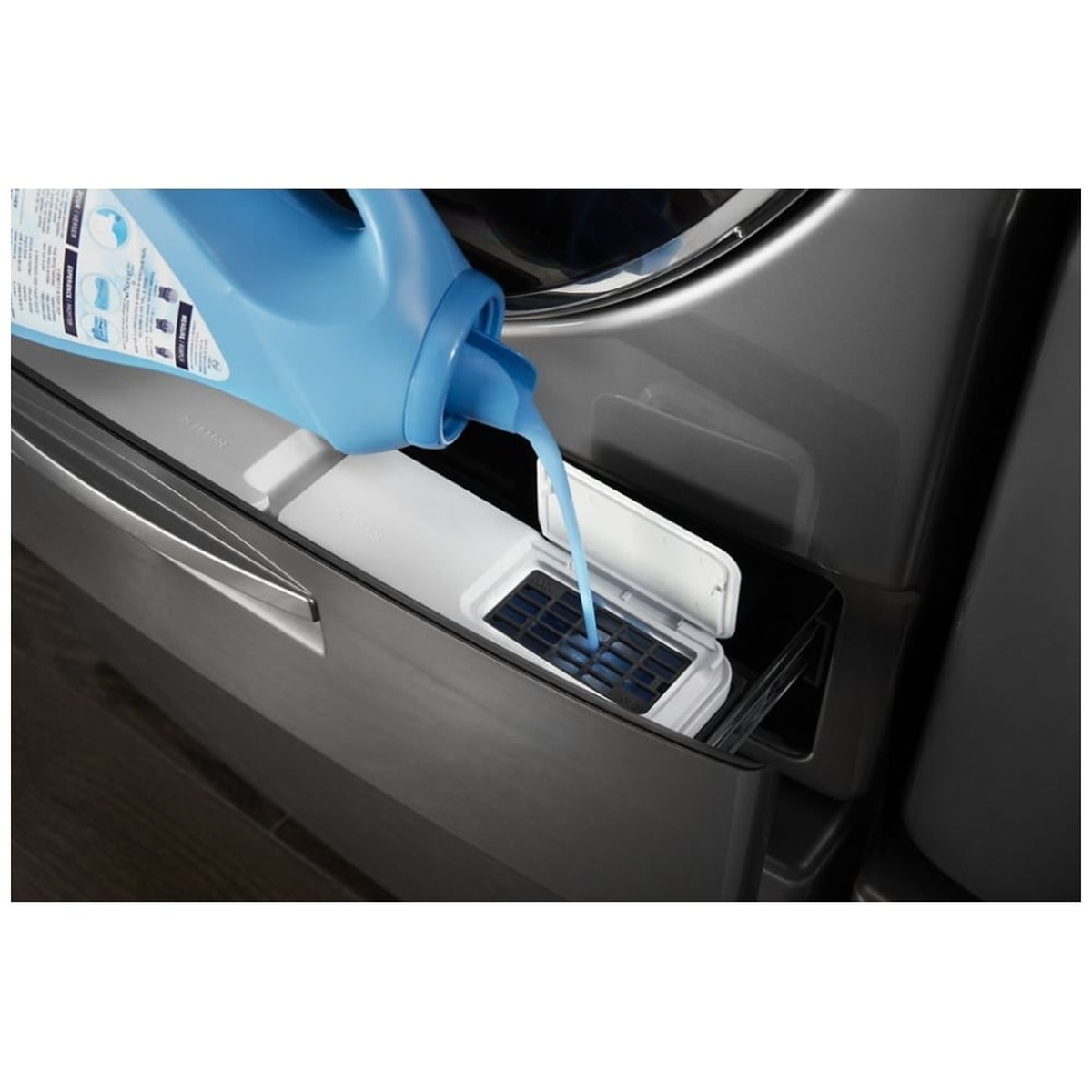 Detergent being poured into the Load & Go XL Plus dispenser drawer