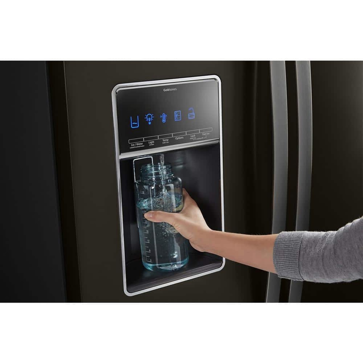 External dispenser filling a large water bottle with filtered water