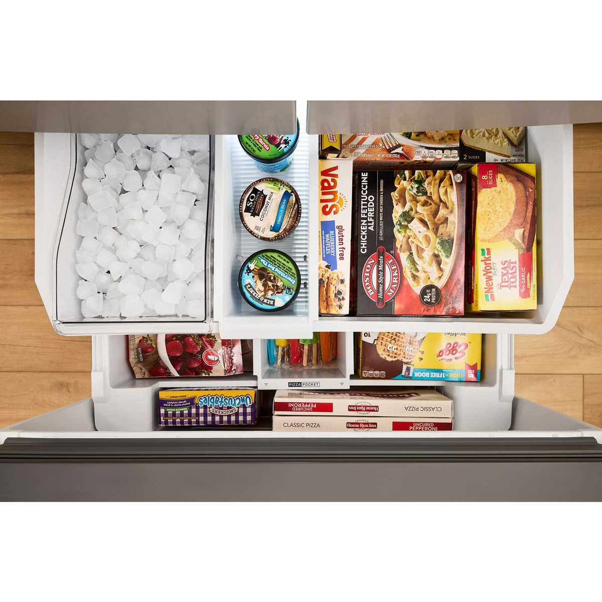 Freezer drawer with large ice bin, pizza pocket and organized frozen foods.