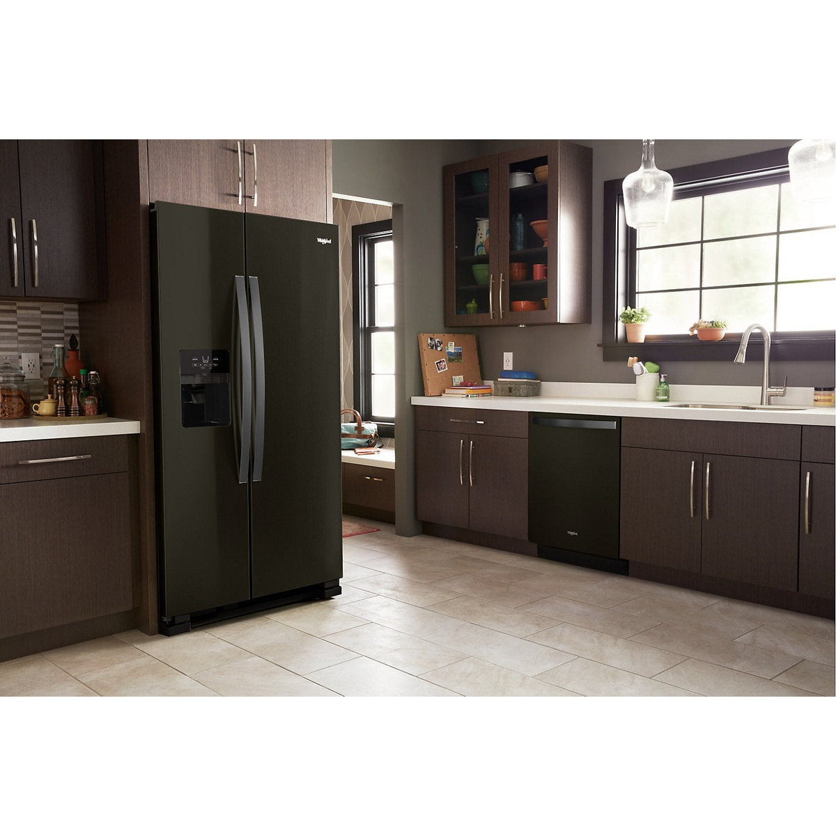 Refrigerator shown in a modern kitchen setting in black stainless finish