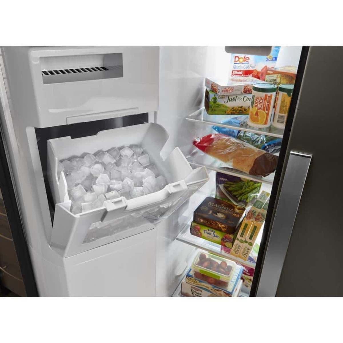 In-door ice bin filled with ice freeing shelf space in freezer