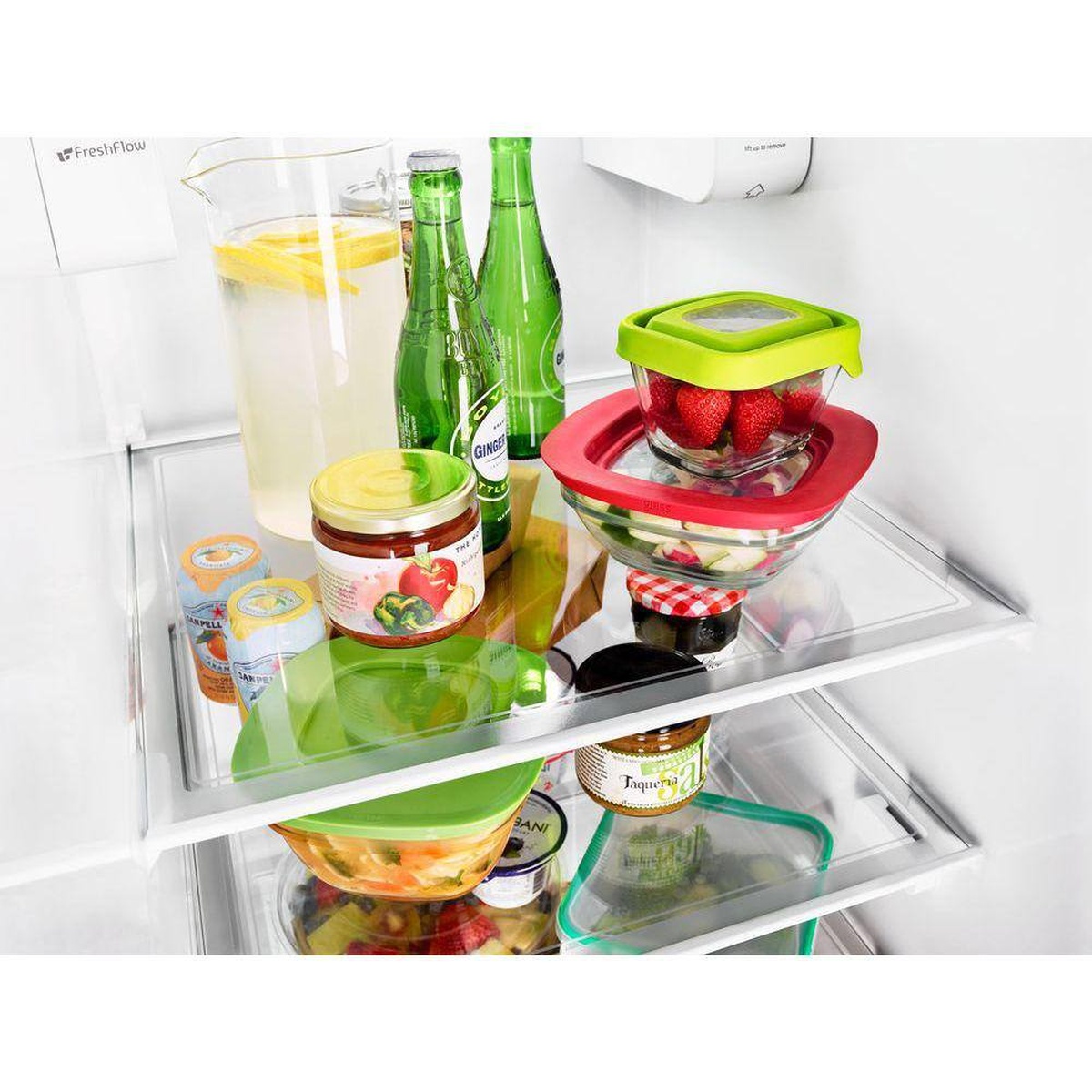 Wall-to-wall frameless glass shelves inside refrigerator