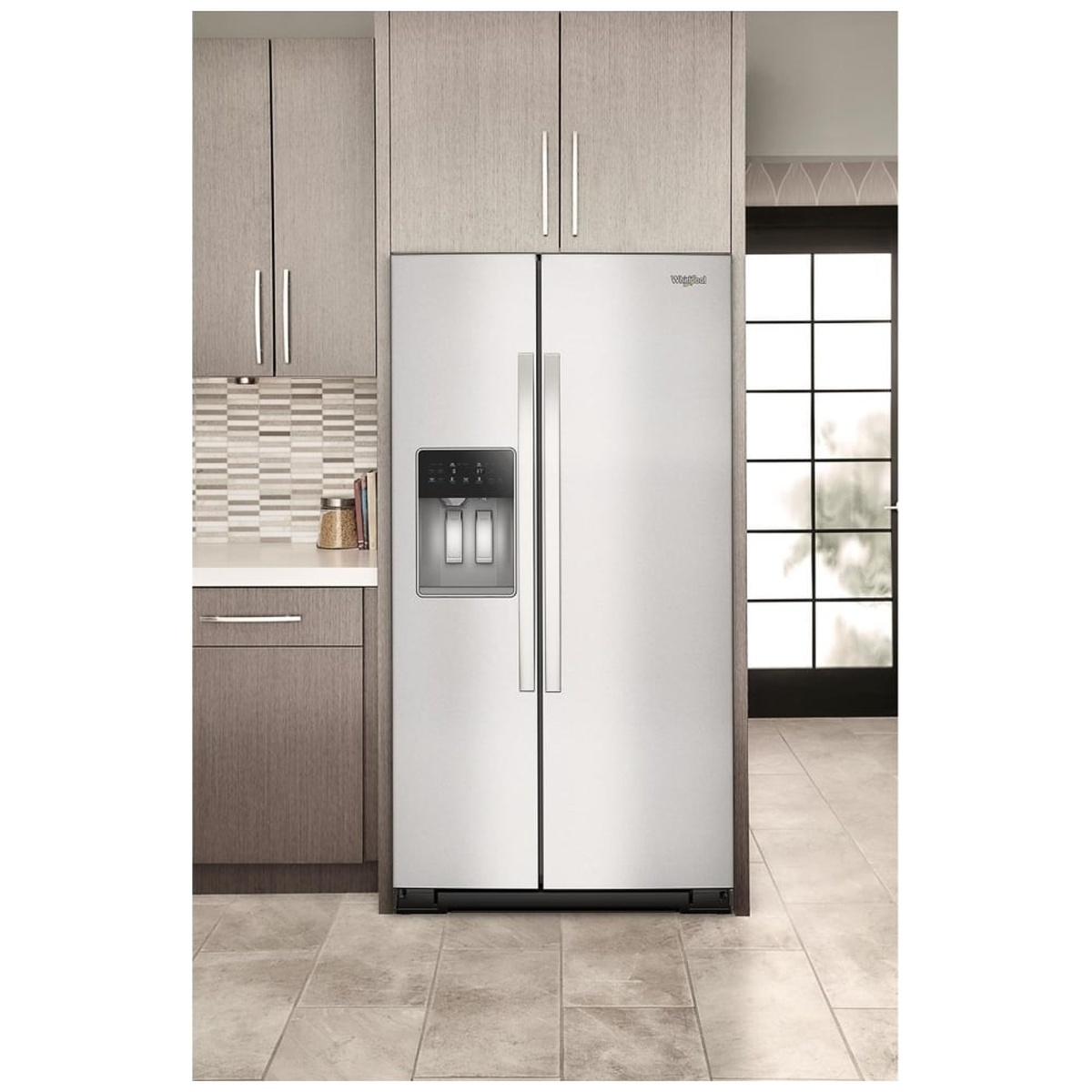 Refrigerator installed flush in a modern kitchen, fingerprint-resistant stainless finish.