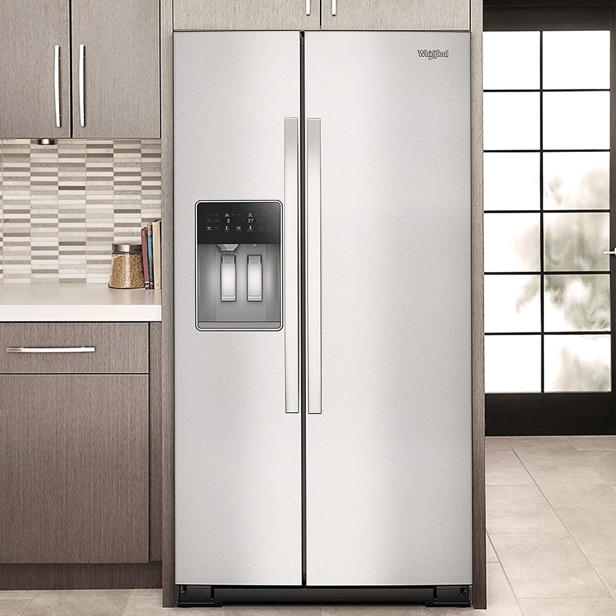 Whirlpool side-by-side refrigerator installed in a modern kitchen