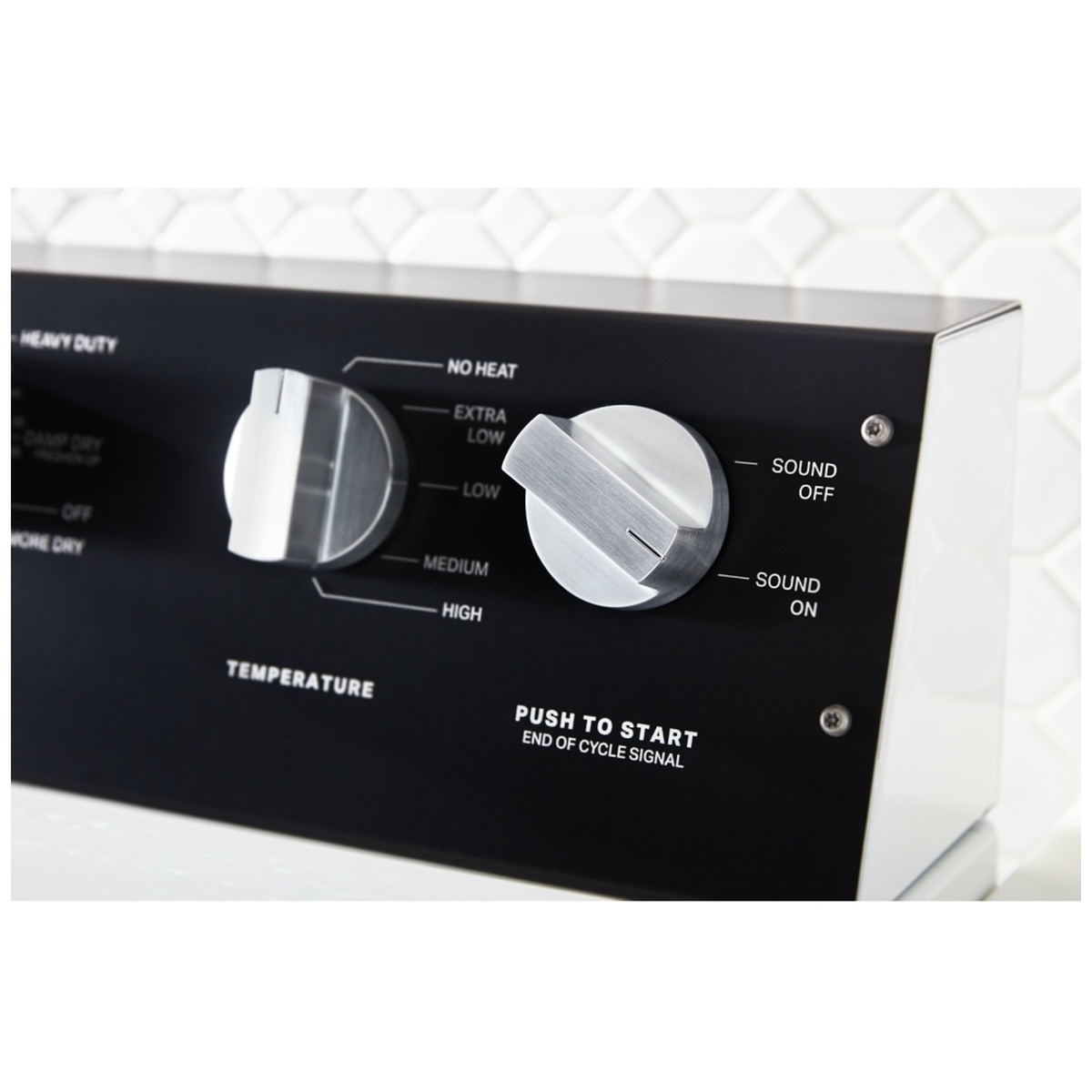 Close-up of dryer control panel with temperature dial and push-to-start knob with sound on/off.
