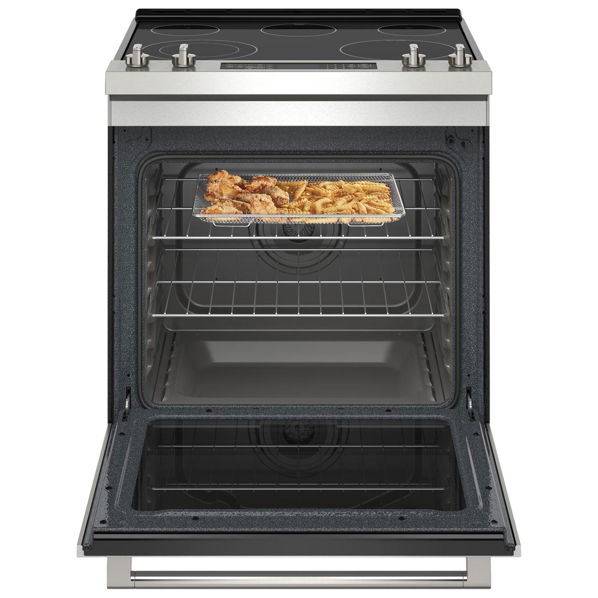 Air fry basket with wings and fries inside the oven