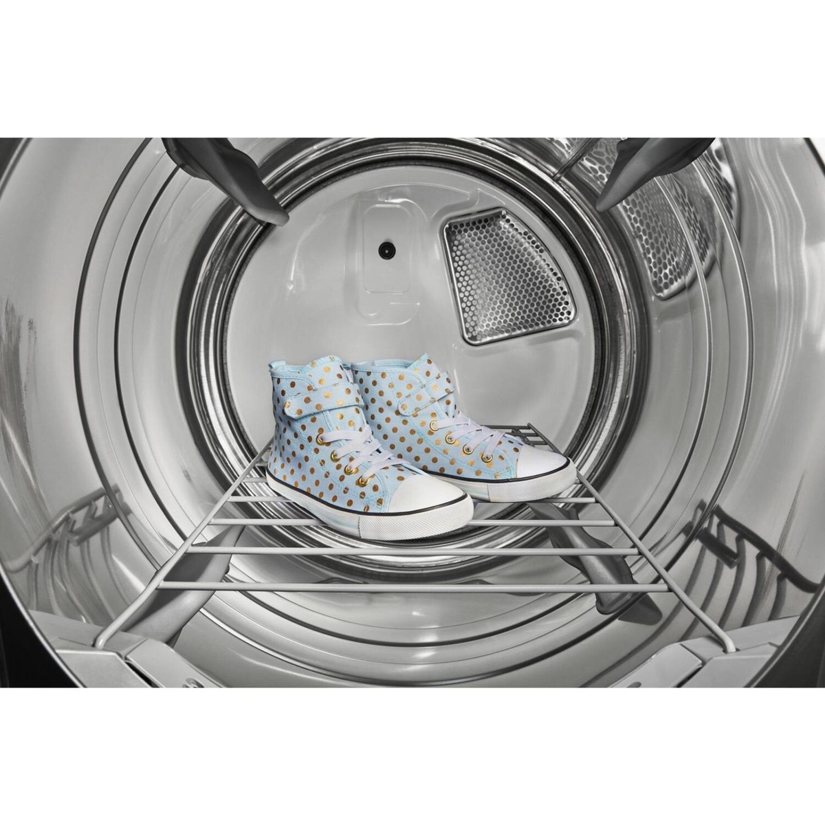 Dryer rack with sneakers placed inside the Whirlpool drum