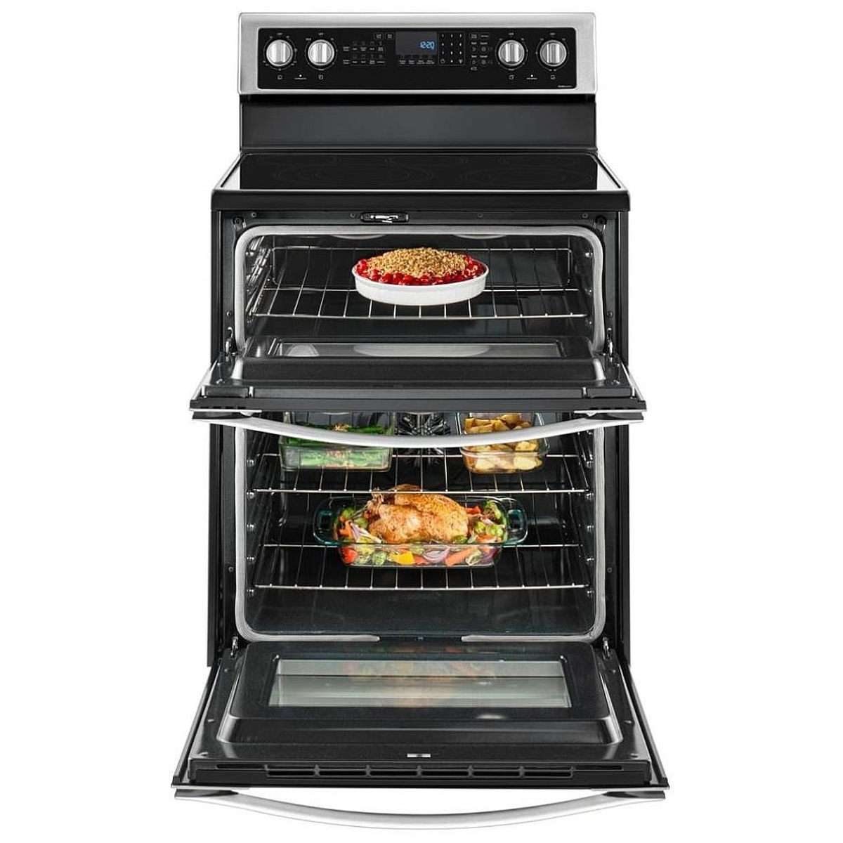 Both oven doors open with multiple dishes baking in the upper and lower cavities.