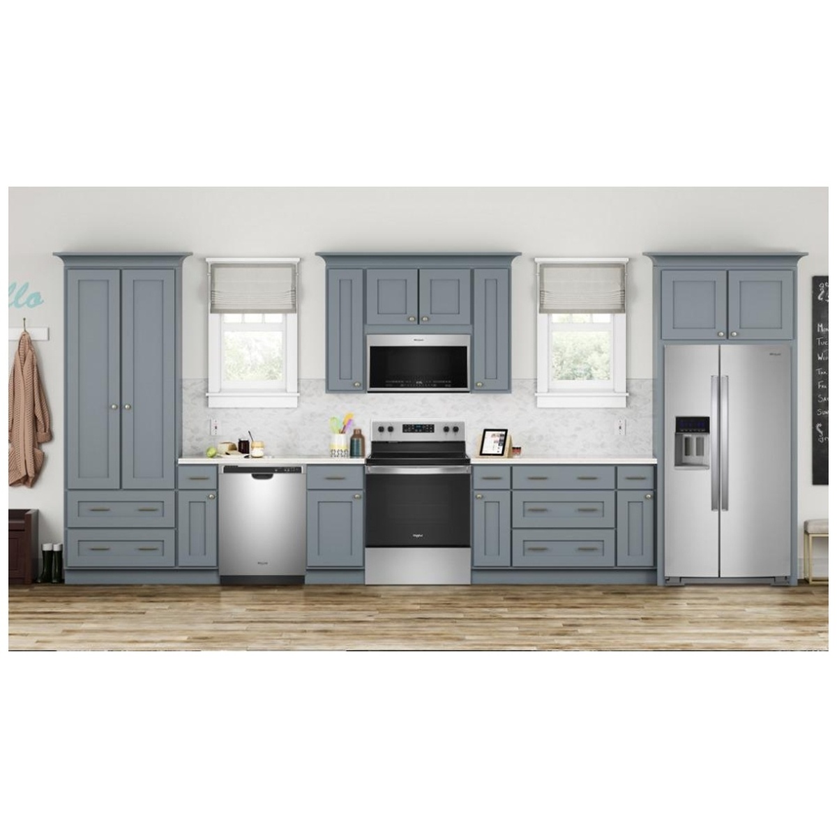 Whirlpool over-the-range microwave installed in a modern kitchen suite above the range