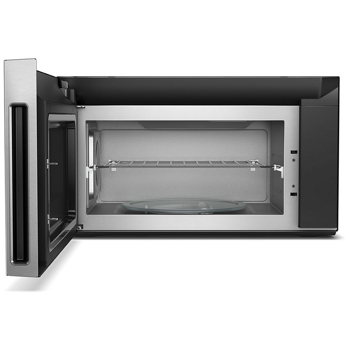 Microwave interior with a metal rack and recessed glass turntable.