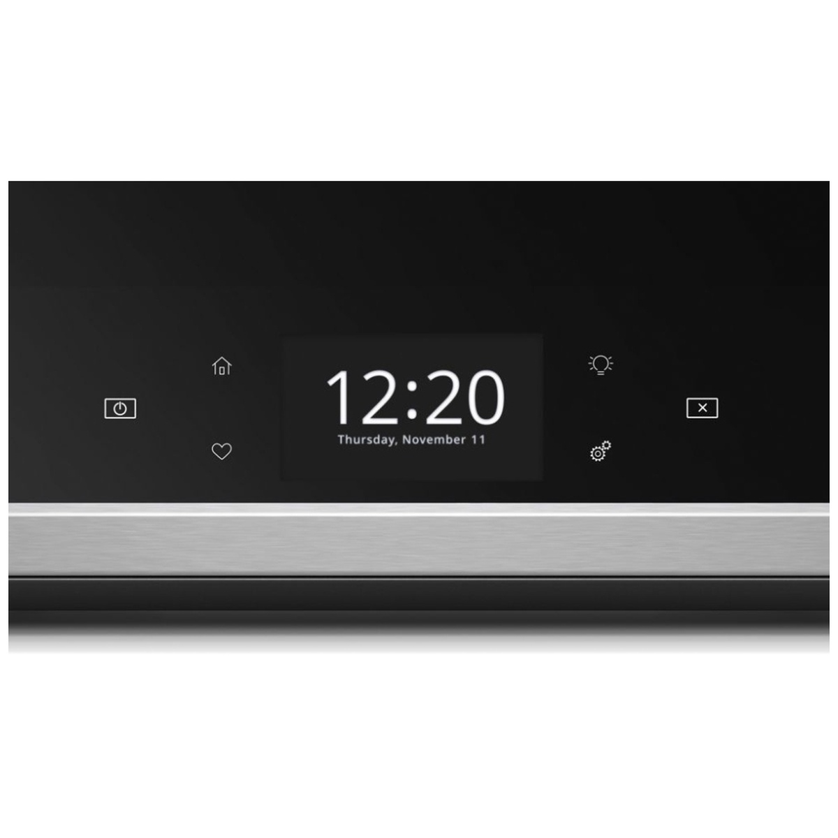 Close-up of the microwave glass touch control panel with digital clock.