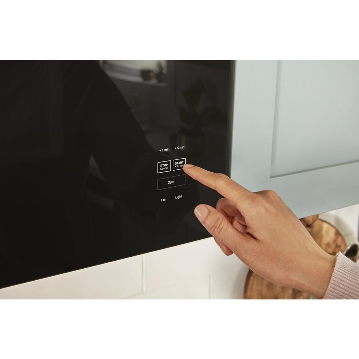 Tap-to-open touch controls on microwave door