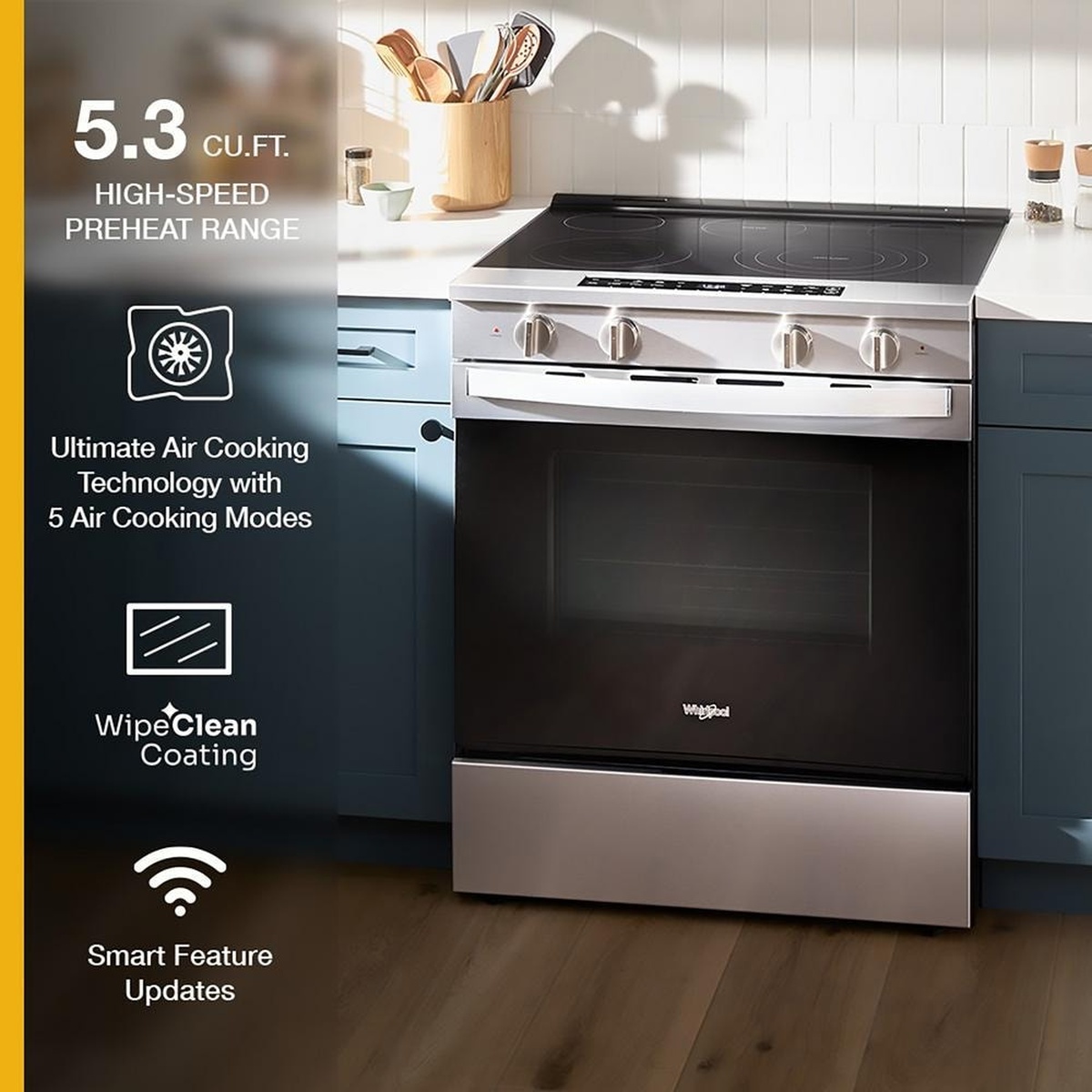 Whirlpool slide-in electric range installed in a kitchen, with on-image callouts for 5.3 cu. ft. capacity, WipeClean coating, and Smart Feature Updates
