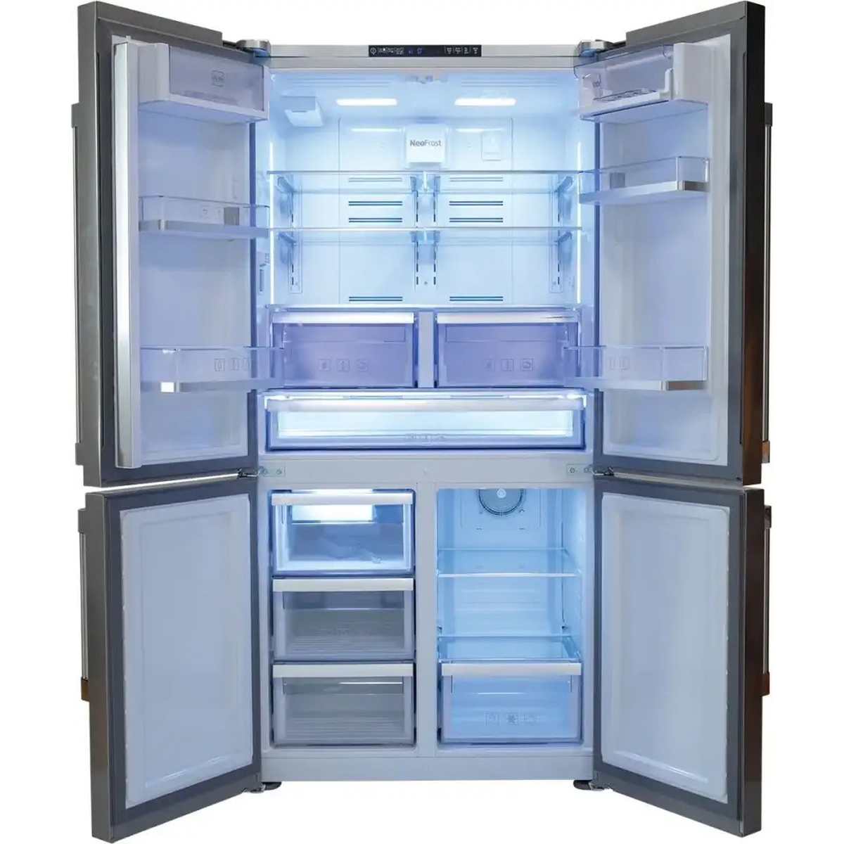 Open Beko refrigerator showing bright interior lighting, adjustable glass shelves, door bins, and multiple drawers