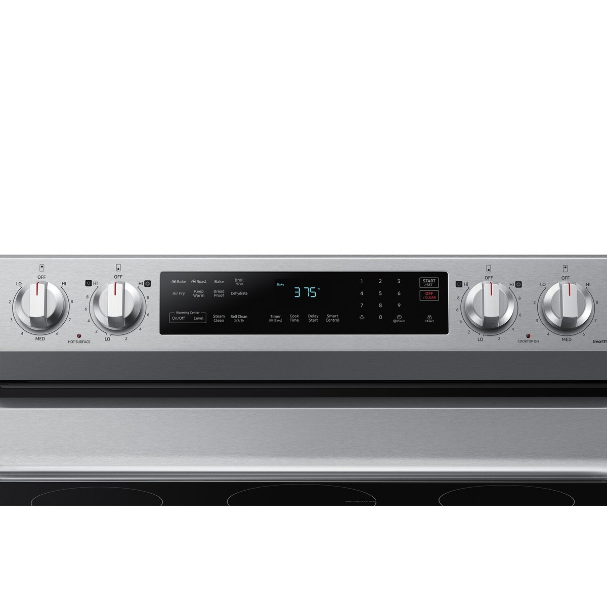 Close-up of the Samsung range control panel with four knobs, a digital display, and mode buttons including Air Fry, Steam Clean, Self Clean, and Smart Control