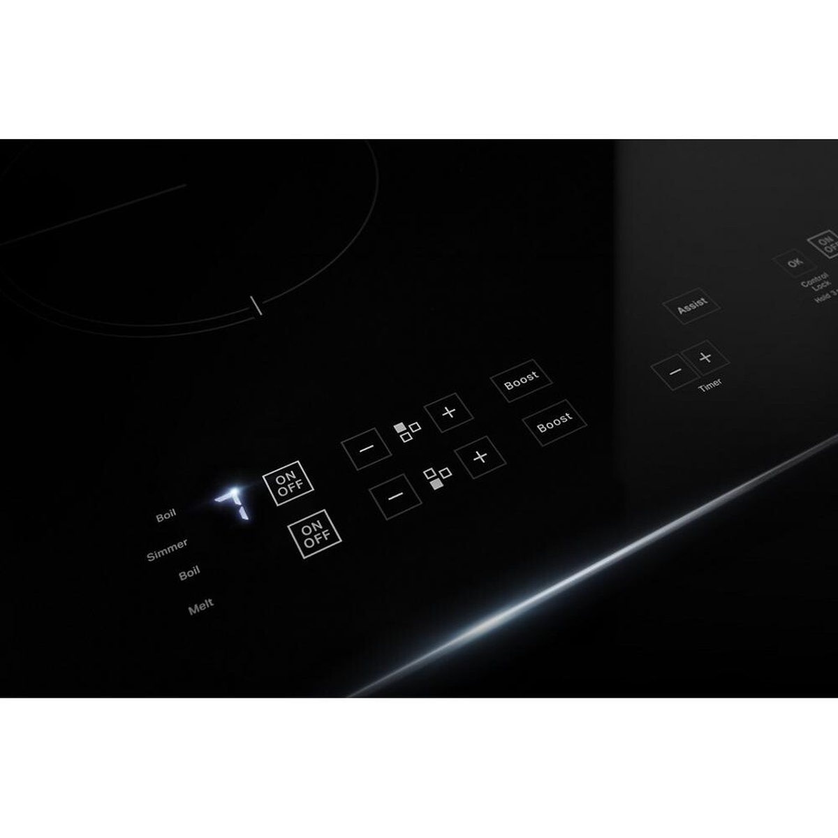 Close-up of JennAir induction cooktop touch controls showing boil, simmer, melt and boost options