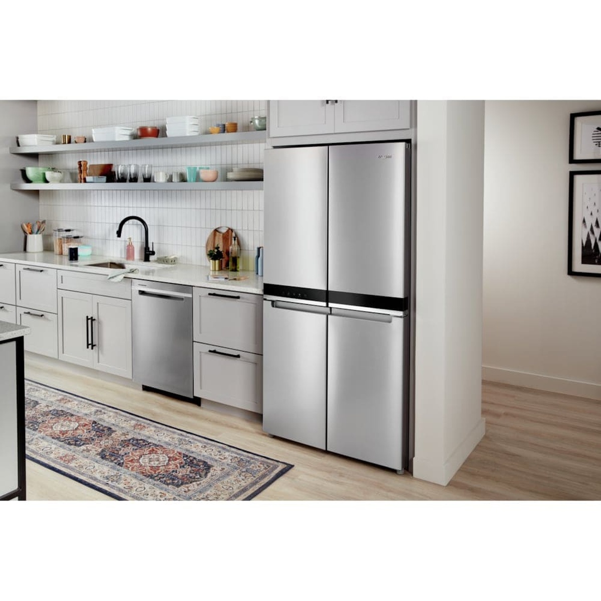 Whirlpool counter-depth 4 door refrigerator installed in a modern kitchen with surrounding cabinetry