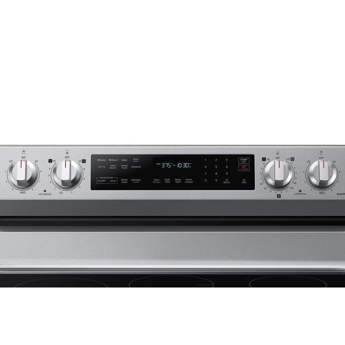 Close-up of the Samsung range backguard showing four burner knobs, a digital display, and oven mode buttons