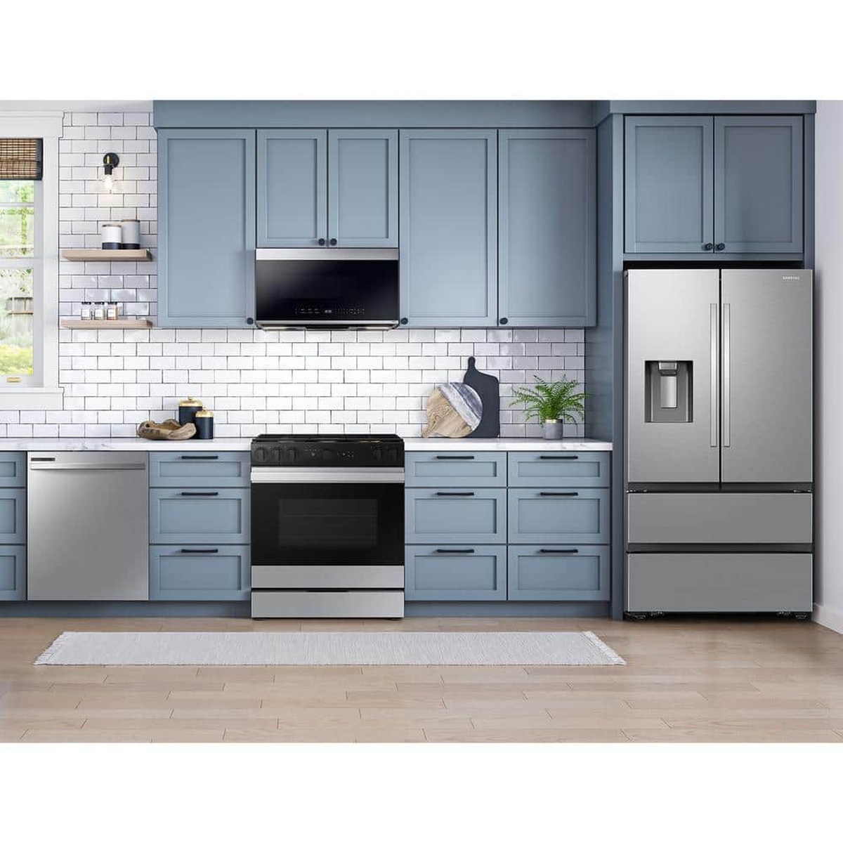 Modern kitchen scene with stainless steel Samsung appliances including a built-in dishwasher
