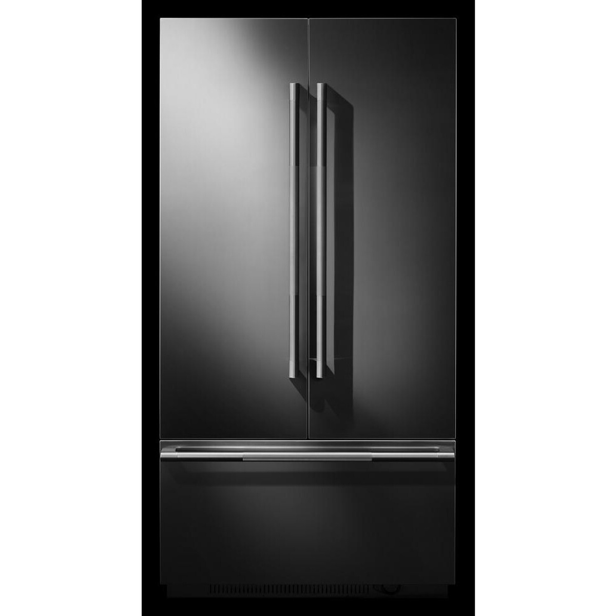 Angled view of a built-in French door refrigerator showing the sleek panel faces and long vertical handles.