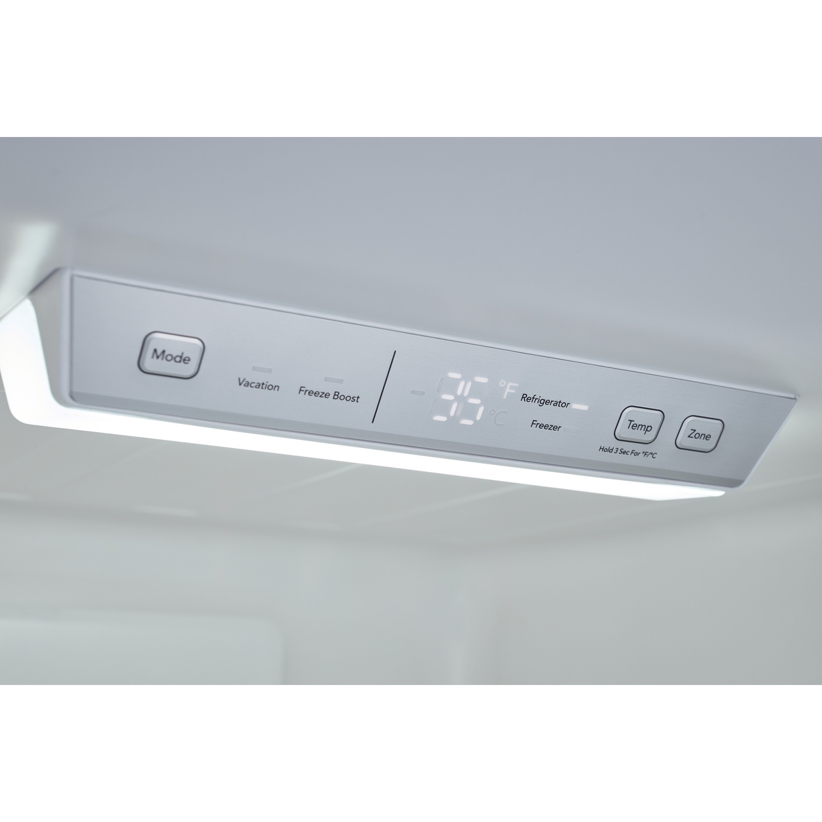 Close-up of the refrigerator’s internal digital control panel showing temperature readout and Mode, Temp, and Zone buttons