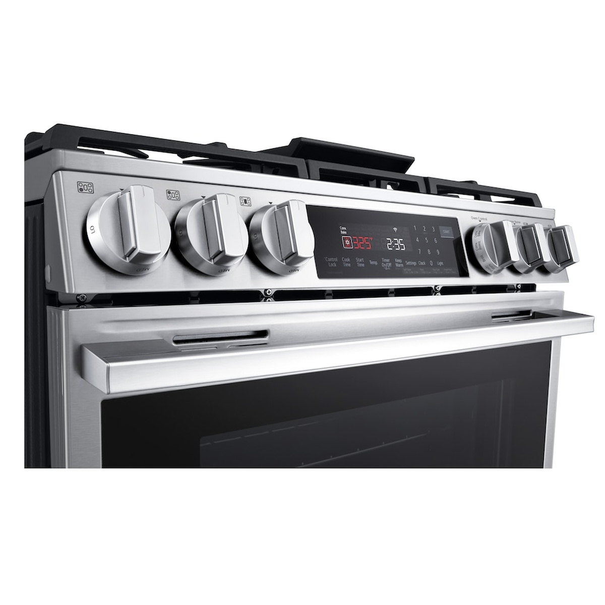 Angled close-up of the LG range front control panel showing stainless control knobs and a digital touch display