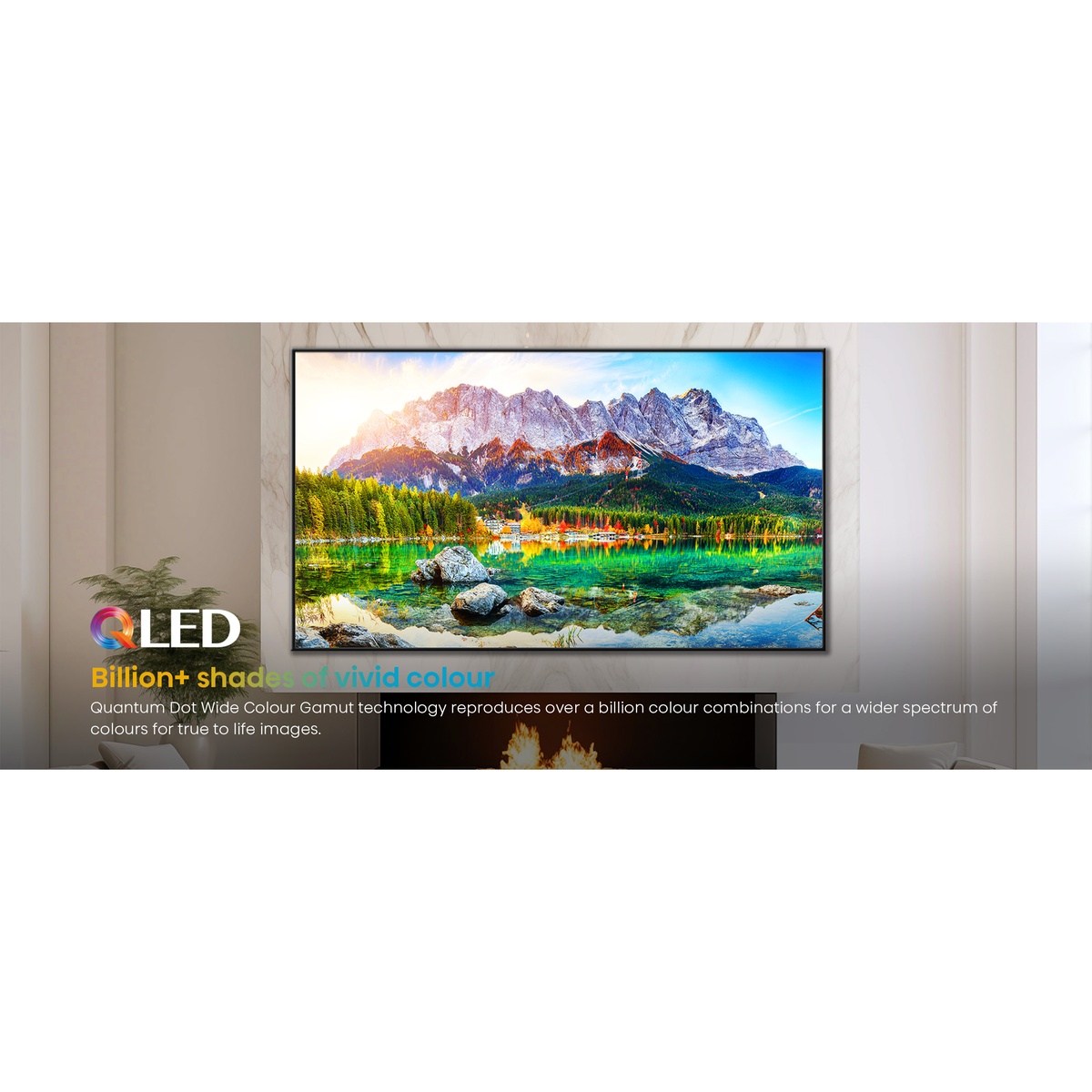 Wall-mounted TV in a living room with on-screen text about QLED and billion-plus shades of vivid colour