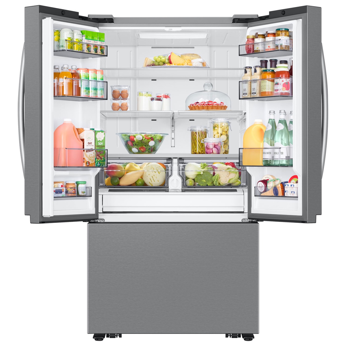 Open Samsung French door refrigerator filled with groceries, showing wide shelves, multiple door bins, and two crisper drawers