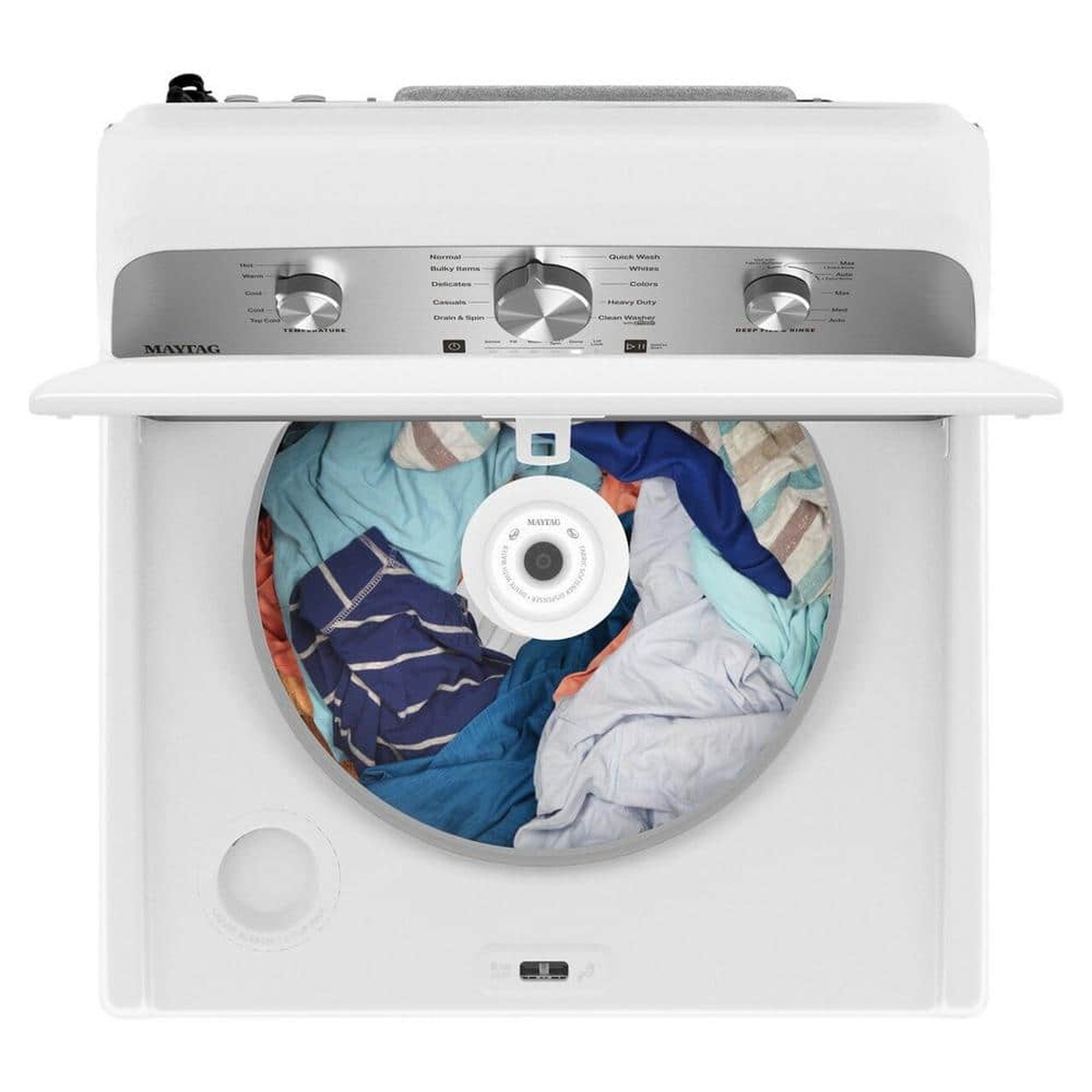 Top-down view inside the Maytag top-load washer with laundry loaded and a center agitator.