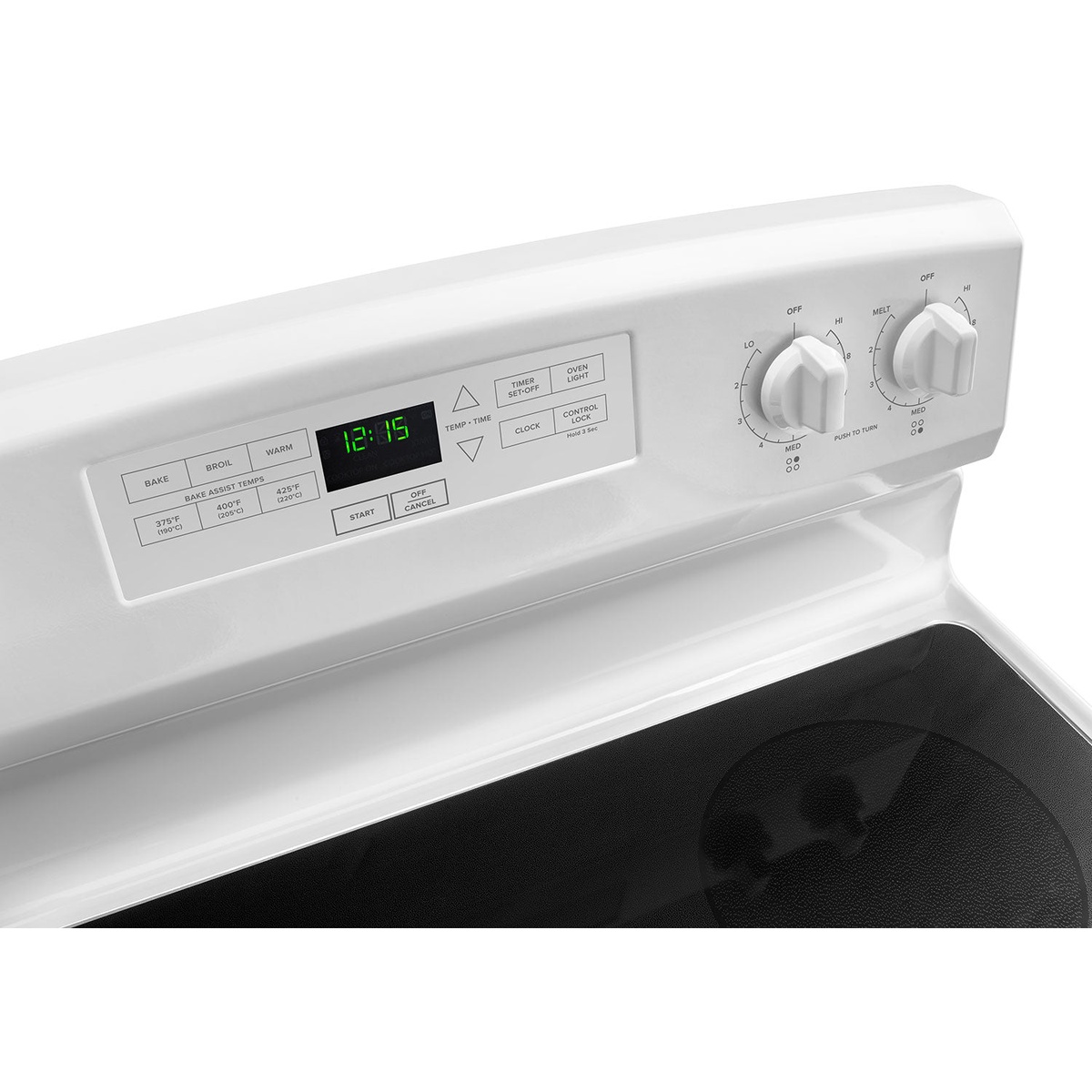 Angled close-up of the range control panel with digital clock, Bake Assist Temps preset buttons, and burner knobs