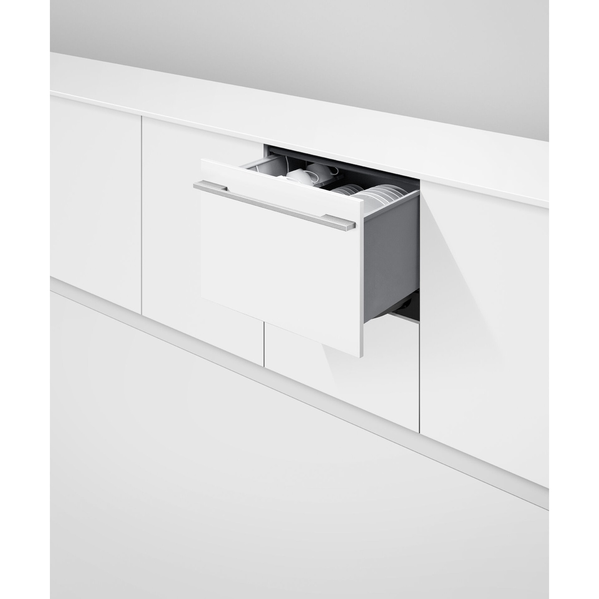Integrated DishDrawer dishwasher installed in white cabinetry with the drawer partially open and dishes loaded inside