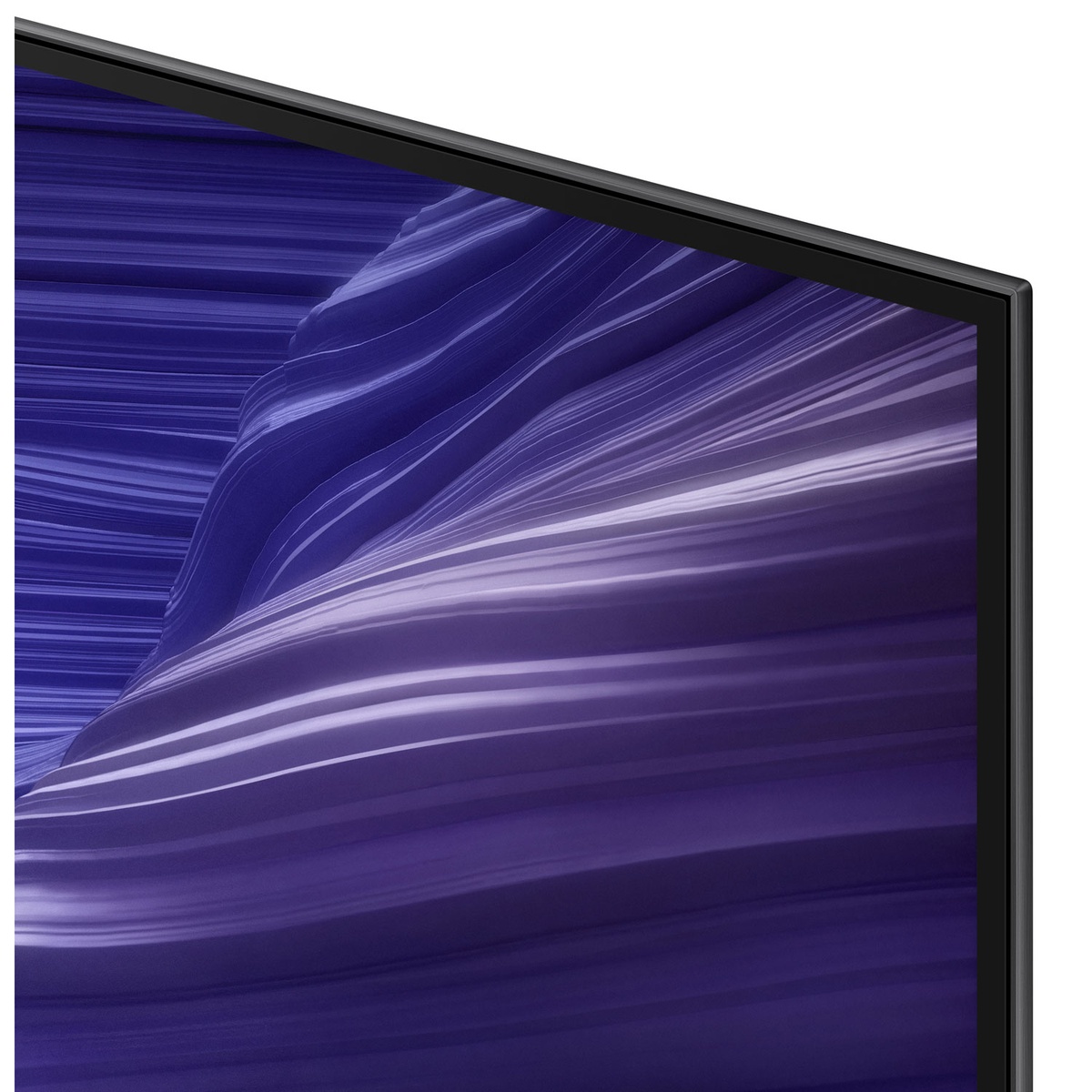 Close-up of the TV corner showing the slim bezel and edge of the screen
