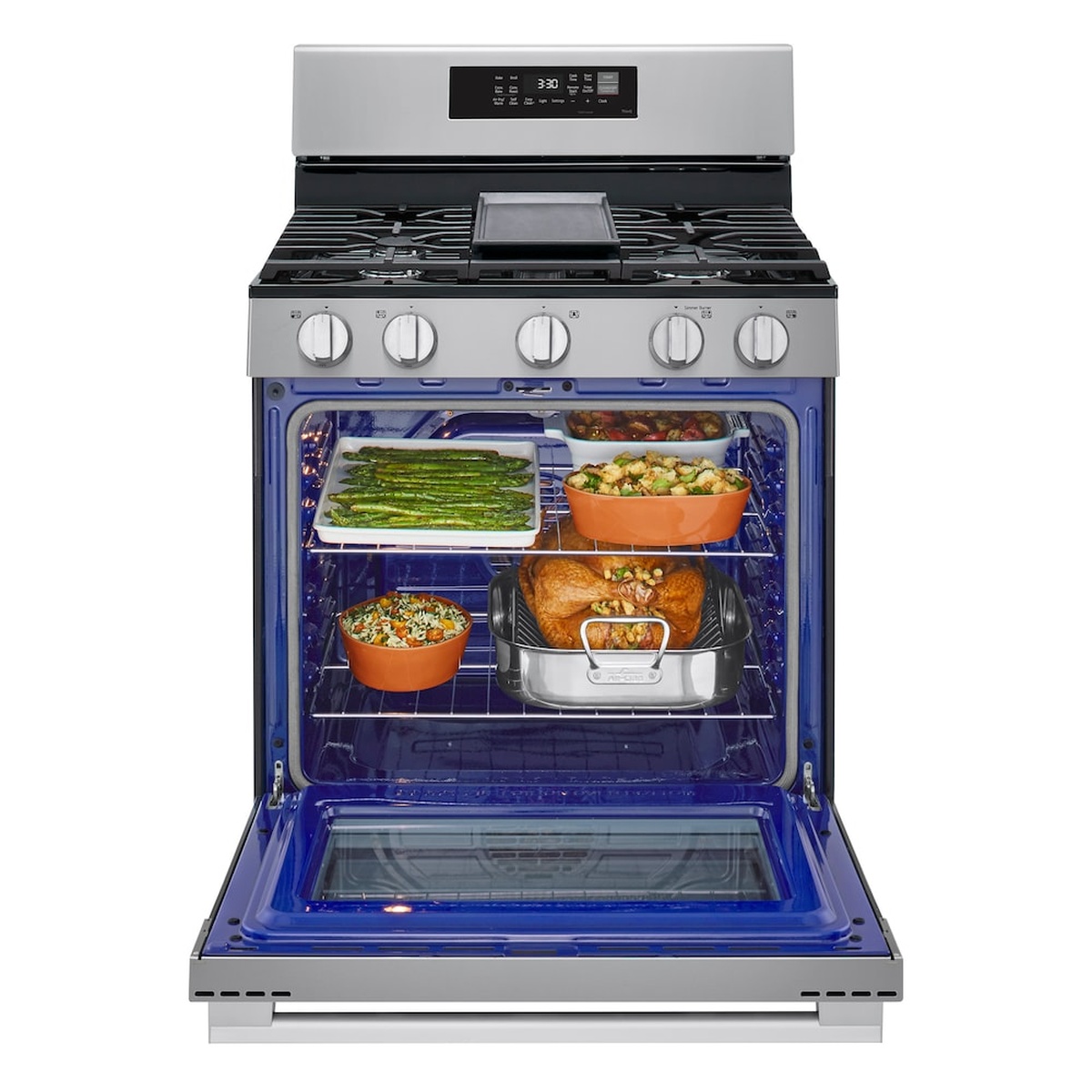 LG gas range with the oven door open, showing two racks holding multiple dishes inside the large oven cavity