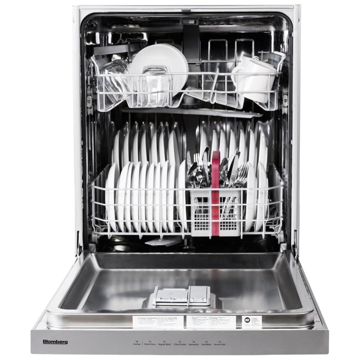 Open Blomberg dishwasher showing stainless interior with upper and lower racks and a cutlery basket loaded with dishes