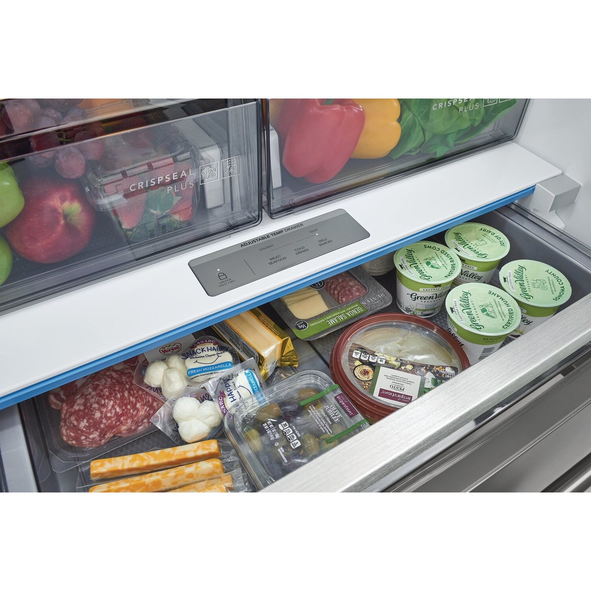 Close-up of the refrigerator adjustable temperature drawer controls and drawer storage