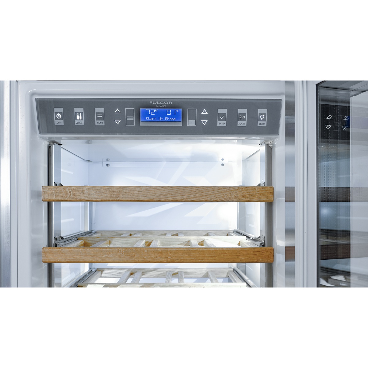 Close-up of the interior control panel with Fulgor Milano branding, digital display, and touch buttons