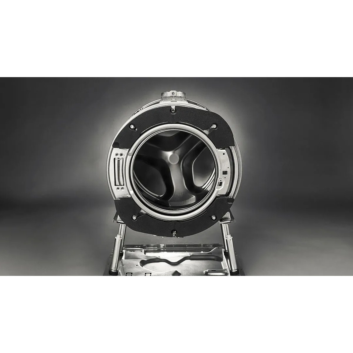 Internal view of a washing machine drum assembly and supports shown against a dark background