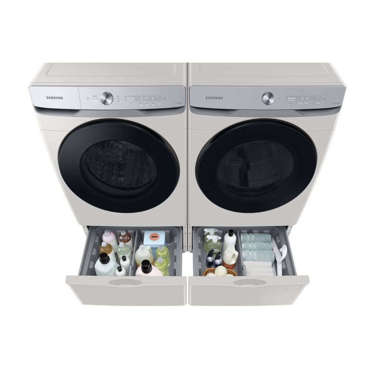 Samsung front-load washer and dryer shown side by side on matching pedestals with both storage drawers open