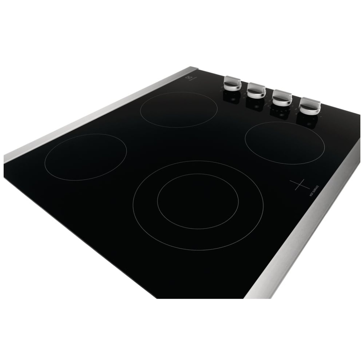Angled view of the Electrolux black glass cooktop showing stainless-look trim edges, four heating zones, and four control knobs
