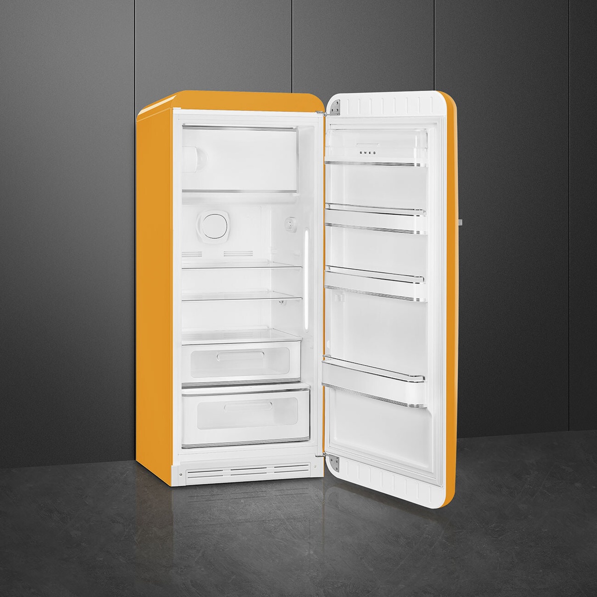 Open Smeg retro refrigerator showing internal freezer compartment, glass shelves, produce drawers, door bins, and LED interior light