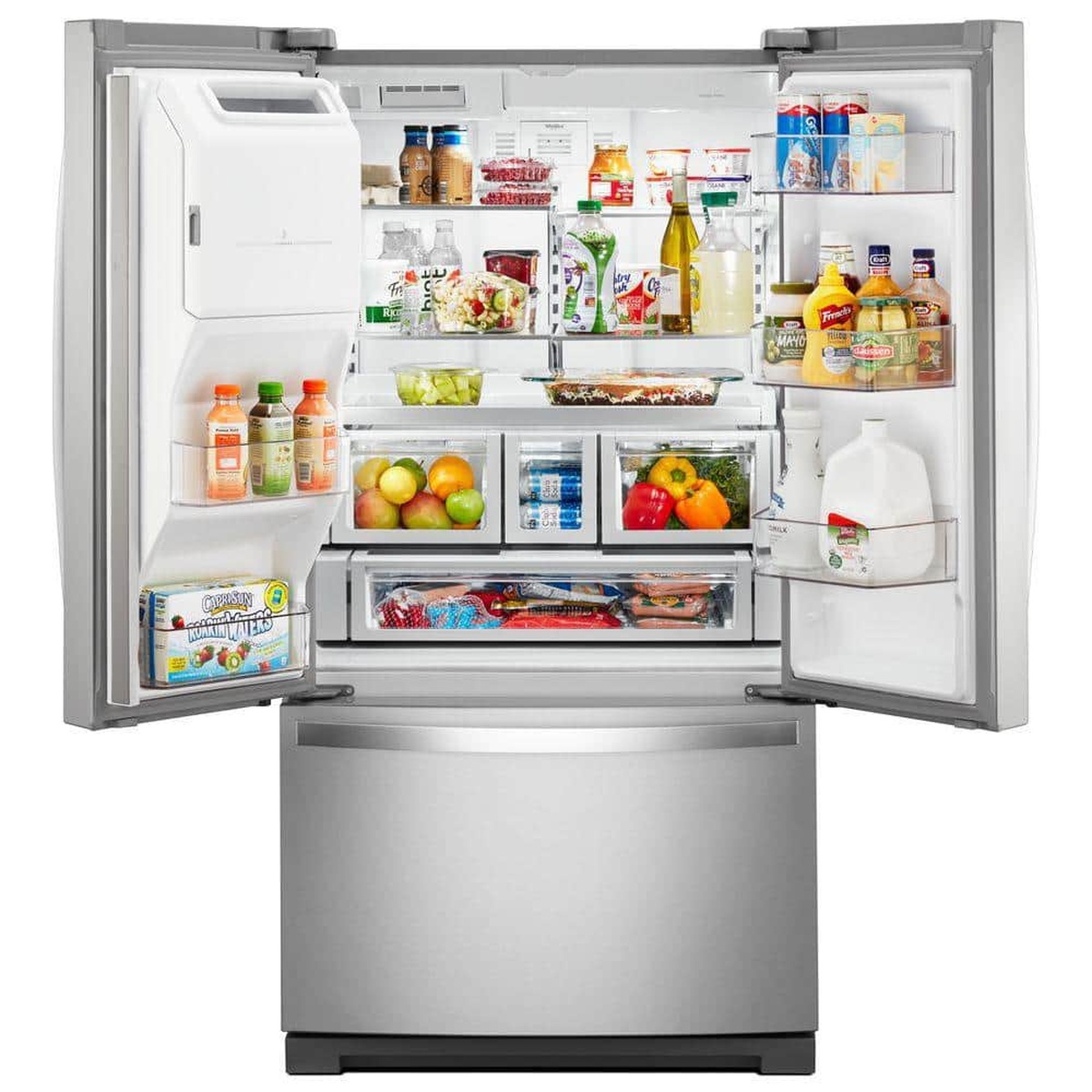 Open Whirlpool French door refrigerator showing shelves, door bins, crisper drawers, and a wide deli-style drawer filled with food