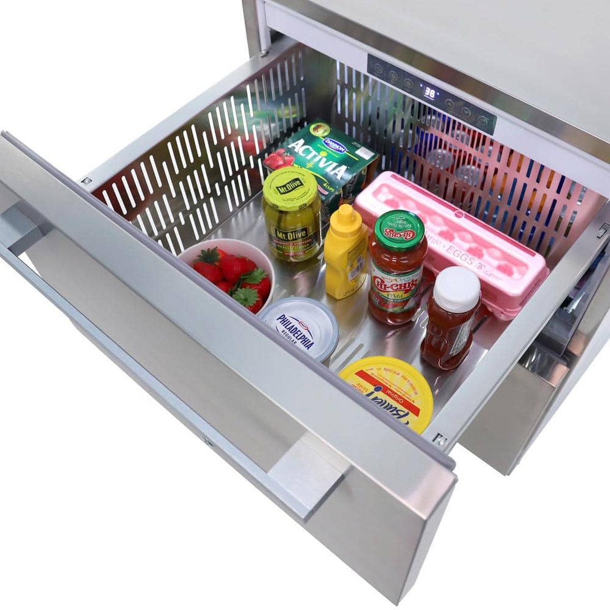 Open refrigerator drawer showing a stainless interior bin with groceries, with a digital temperature display visible along the top edge