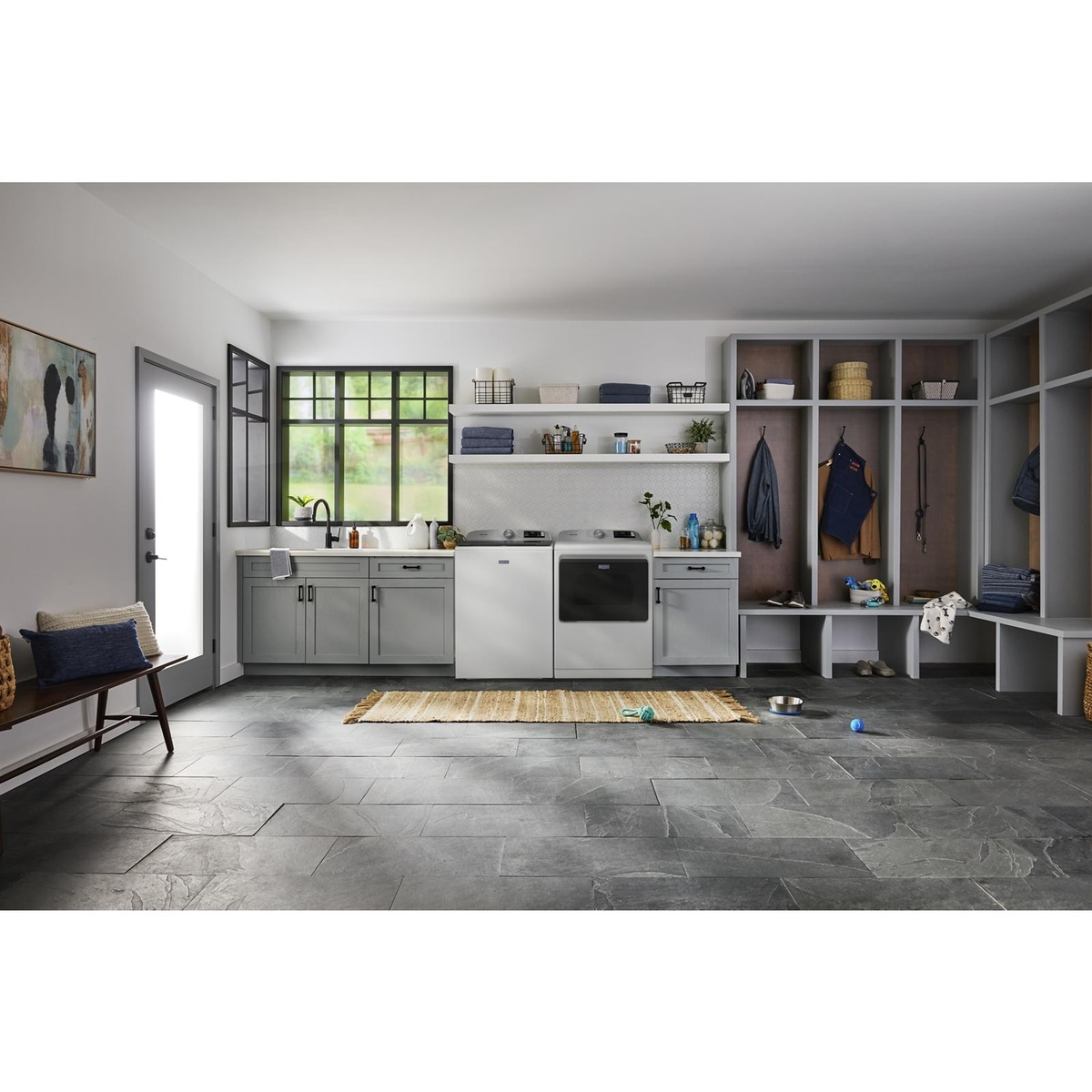 Modern laundry room with Maytag washer and matching Maytag dryer installed side by side