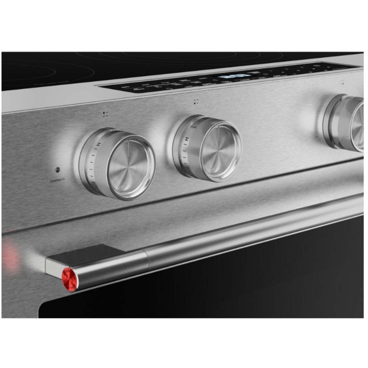 Close-up of KitchenAid range stainless control knobs, control panel, and oven handle