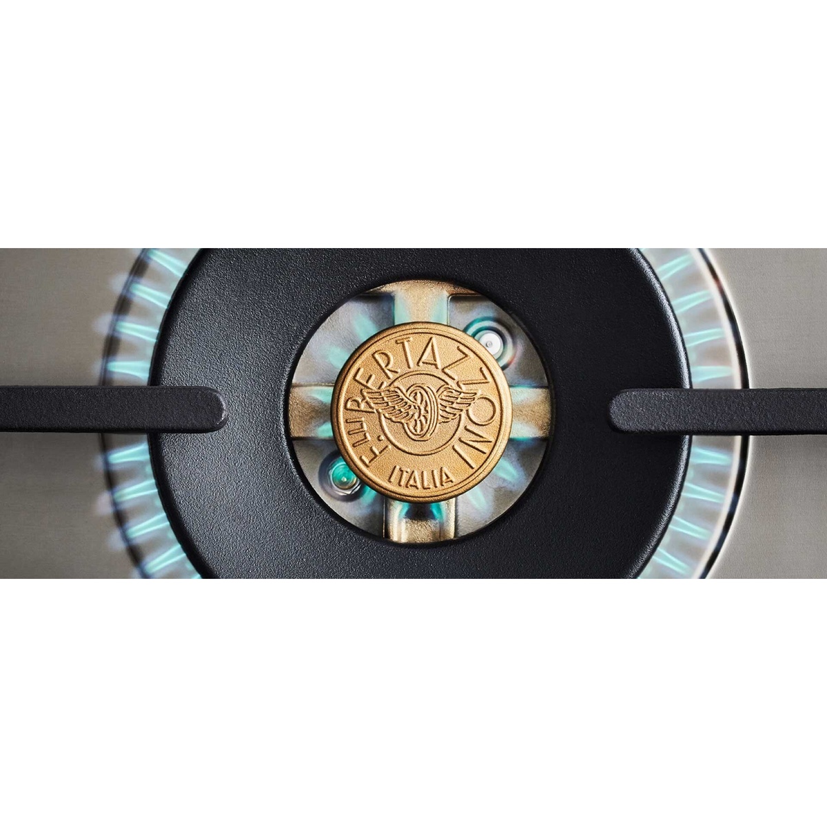 Close-up of a Bertazzoni burner cap with the Bertazzoni Italia logo surrounded by a blue gas flame